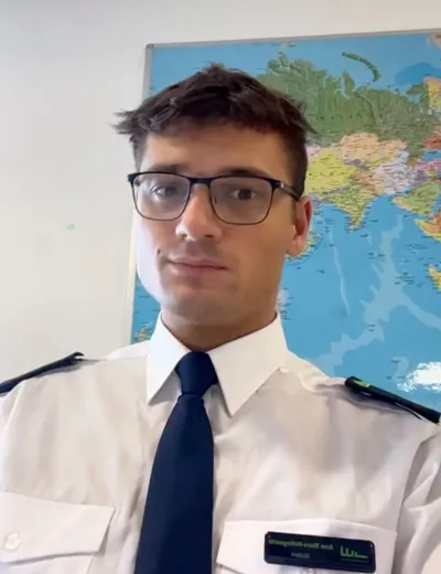 Portrait of Charlie in pilot uniform